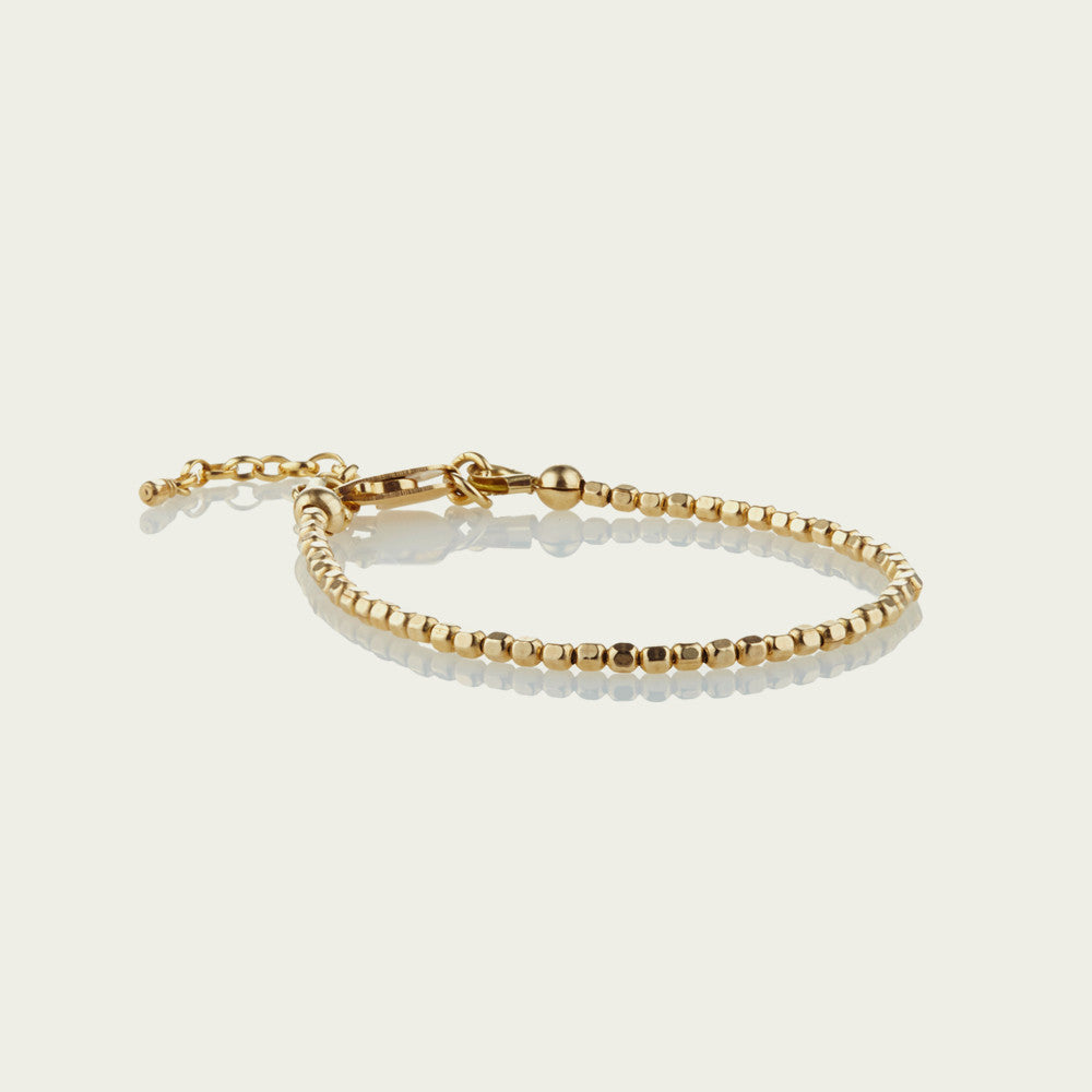 Tiny 14kt Gold-Fill faceted beads are strung on very strong wire to make this delicate best-selling piece. This gorgeous bracelet looks great stacked, with others from our precious metal range or on its own. Incredibly durable yet exquisitely delicate.